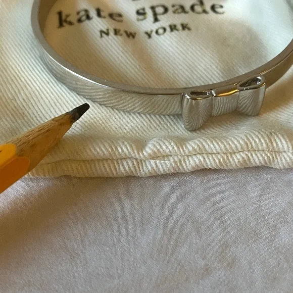 Kate Spade: Silver Tone Bow Bracelet- Marks - Picture 14 of 16